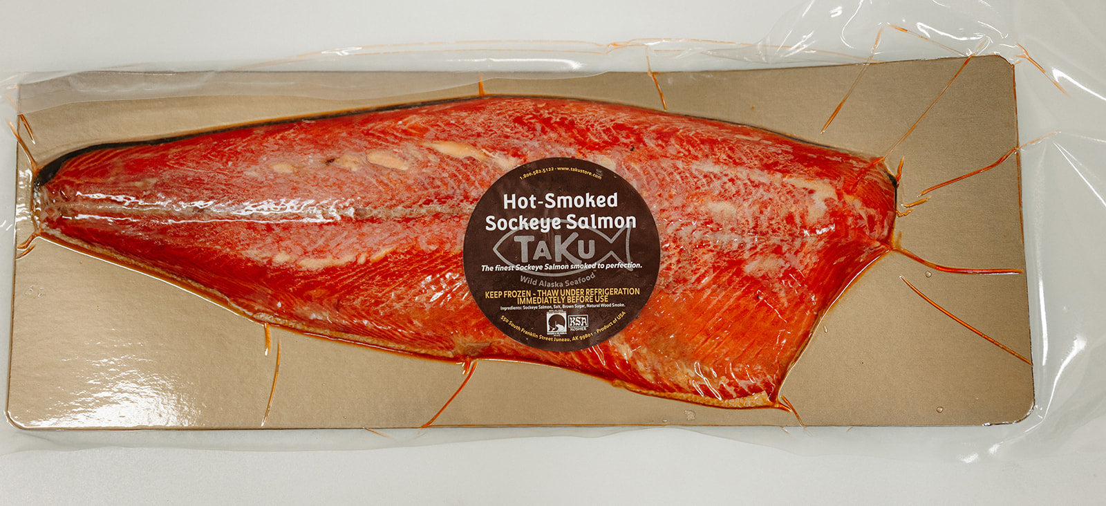 Hot smoked Sockeye Salmon plated with crackers and capers