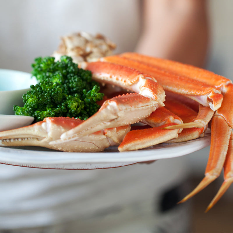 Snow Crab Legs plated with butter